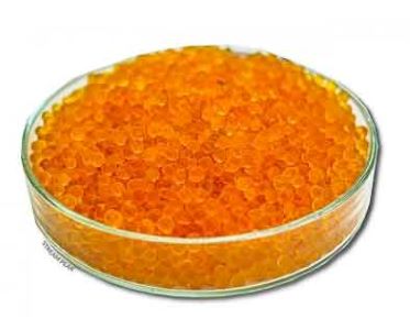 Glass tray filled with Orange Silica Gel Desiccant