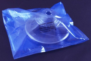 A metal part covered in a transparent blue colour VCI Poly Film Bag